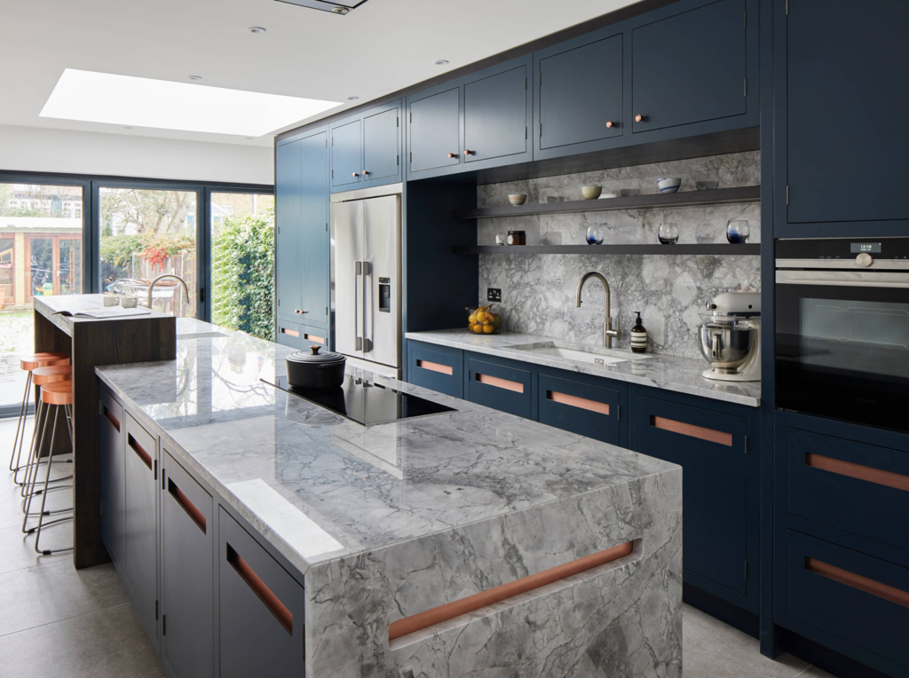 Gray kitchen with a marble backsplash