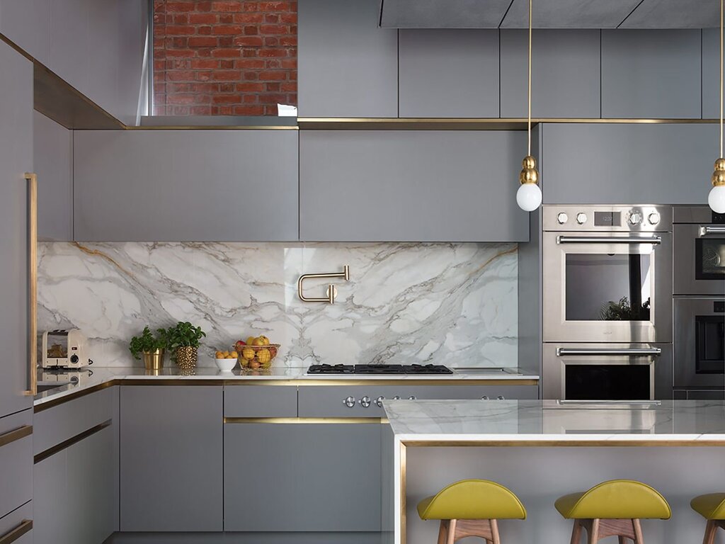 Gray kitchen with gold handles