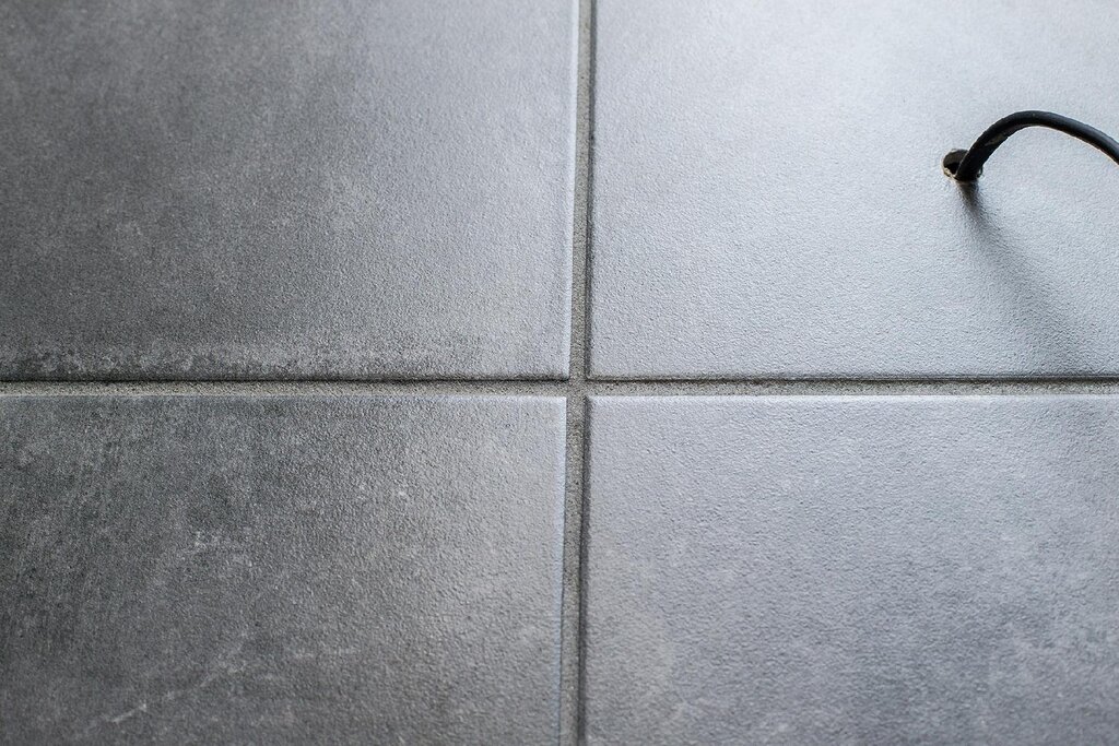 Gray tiles with dark grout