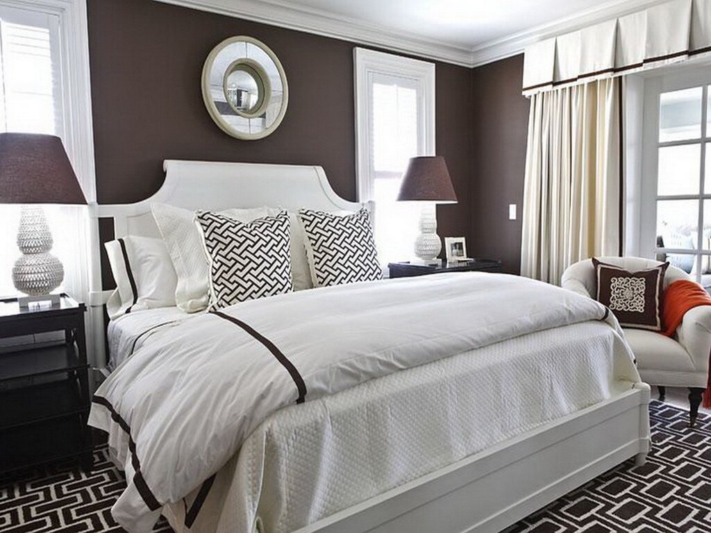 Gray bedroom with brown furniture