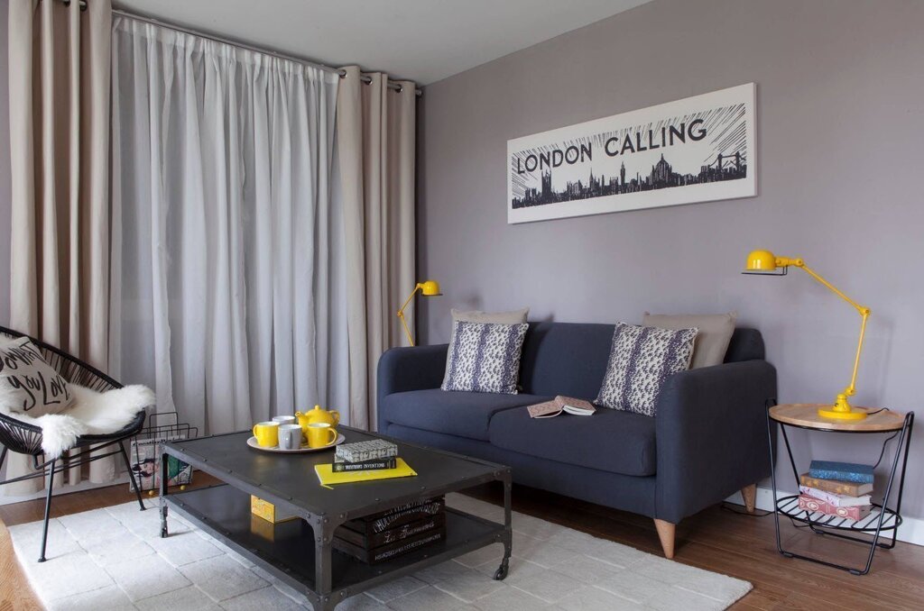 Gray curtains in the living room interior