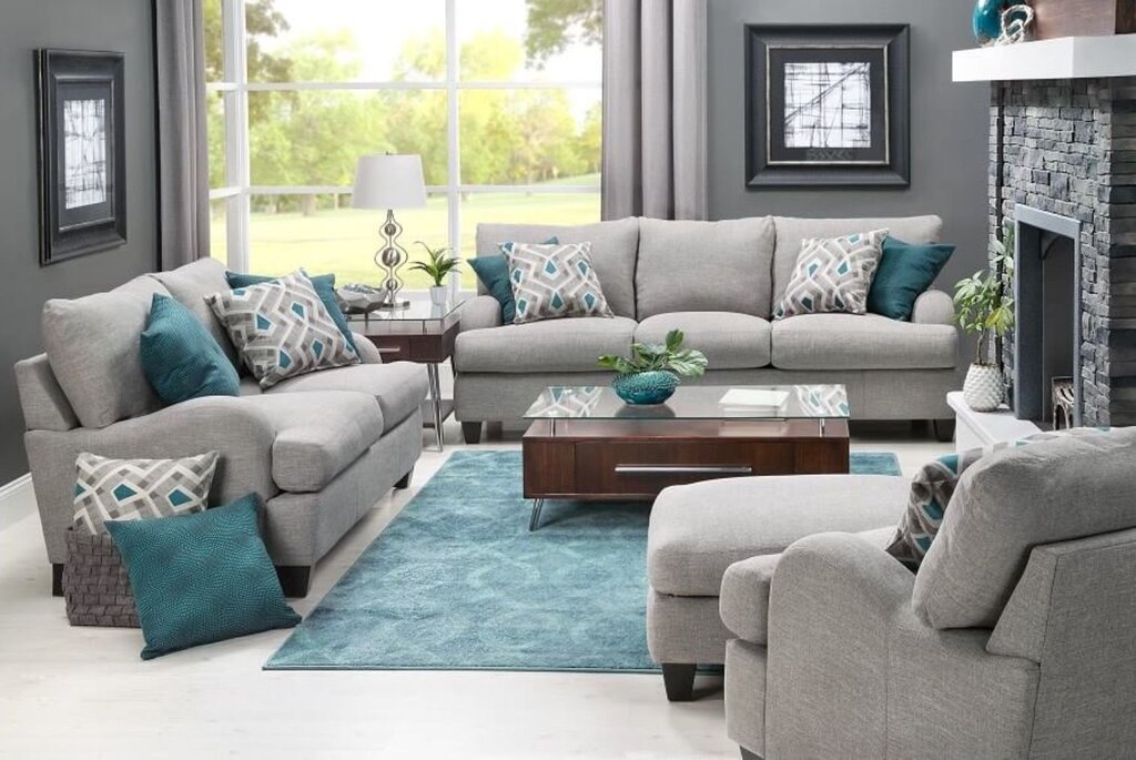 Gray sofa with turquoise pillows