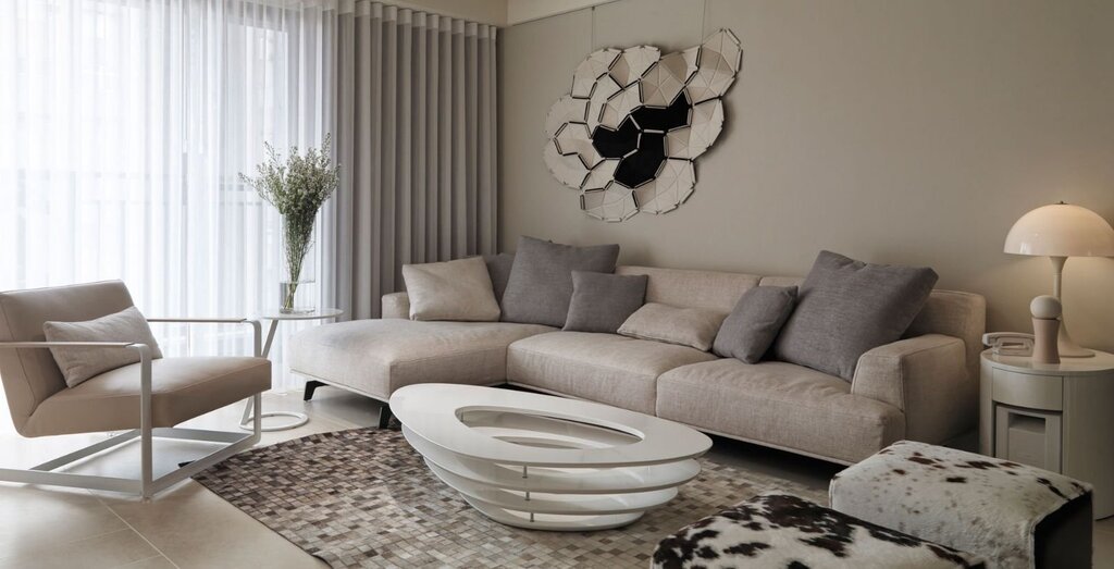 Gray sofa in a beige interior