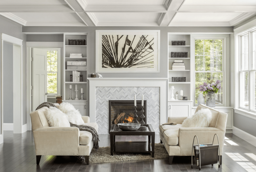 A gray fireplace in the living room interior