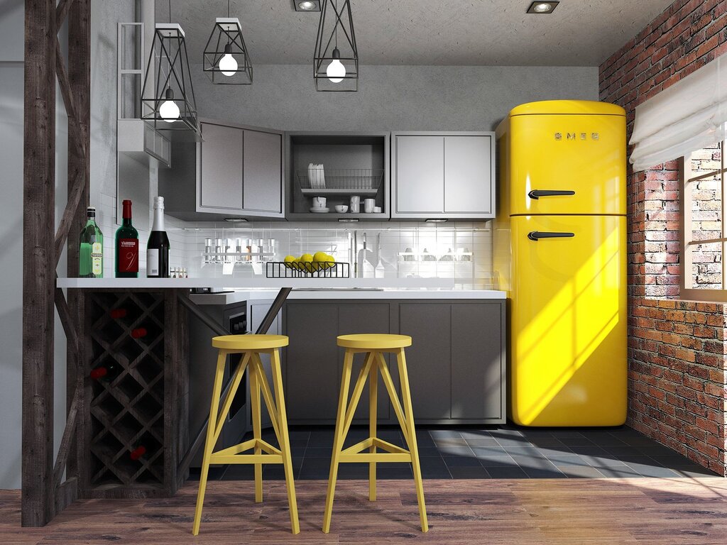 A gray refrigerator in the kitchen interior