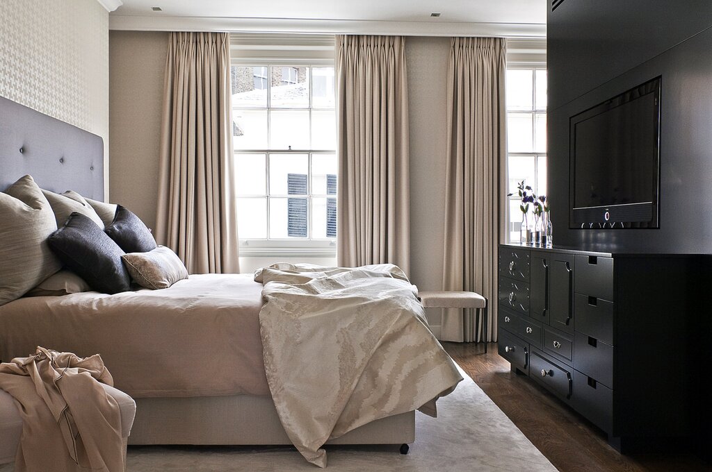 Gray-beige curtains in the interior