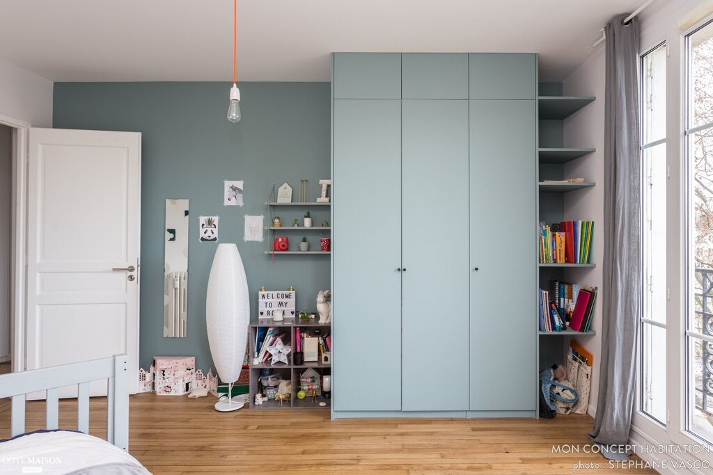 A wardrobe up to the ceiling for the children's room