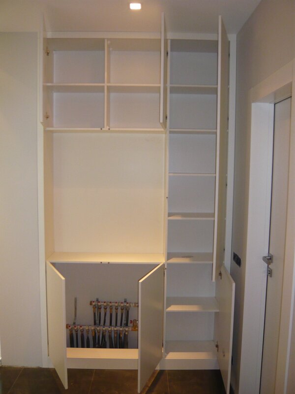 A drywall closet in the hallway