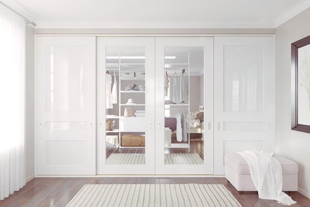 Sliding wardrobe with a mirror for the living room