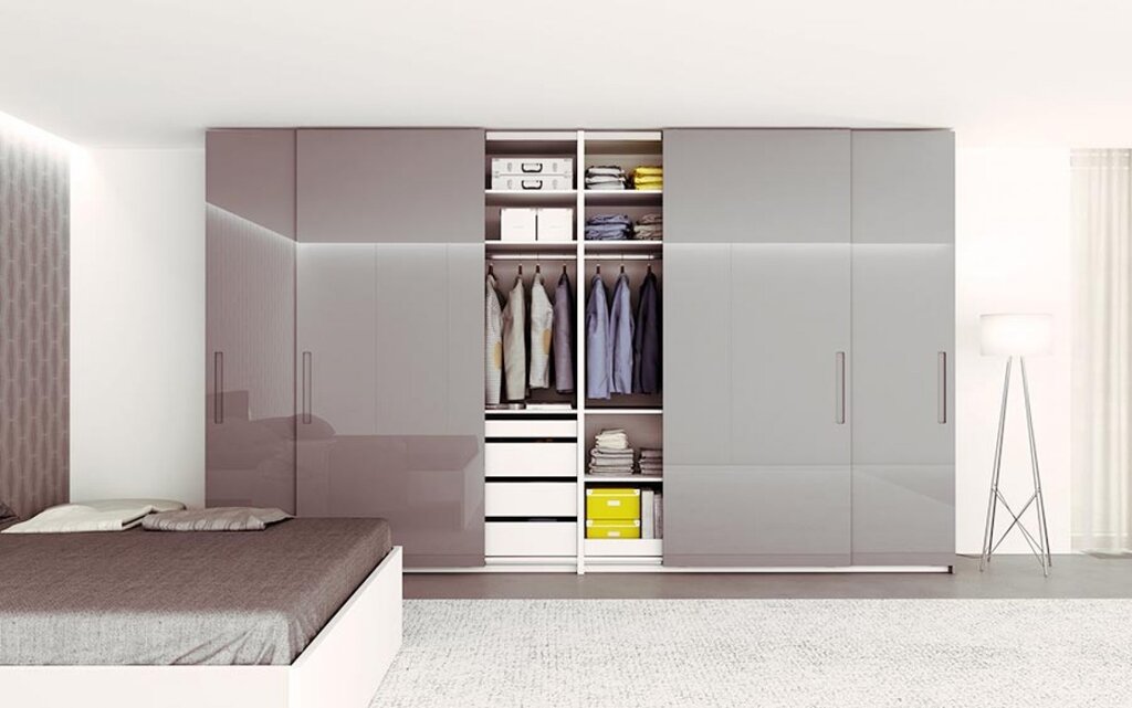 Sliding wardrobe in the room