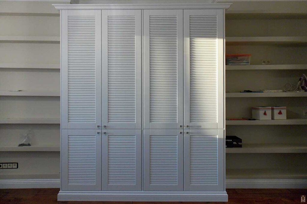 Cabinet with louvered doors