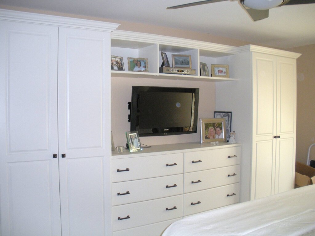 A wardrobe with a chest of drawers for the bedroom