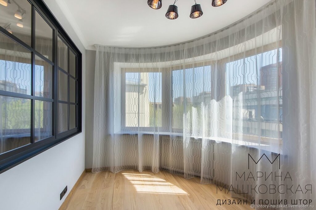 Curtains on a balcony with panoramic glazing