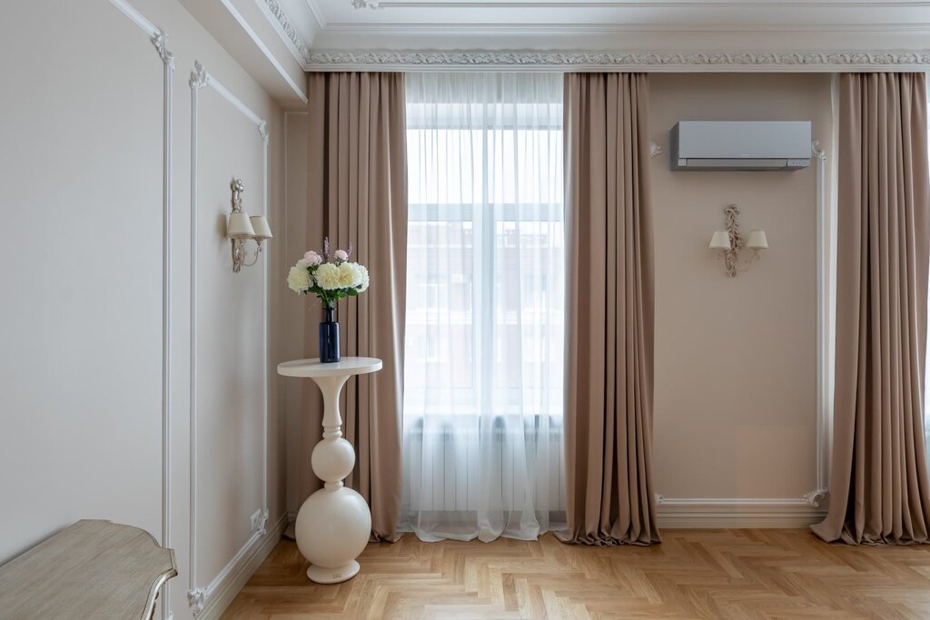 Curtains behind the ceiling cornice