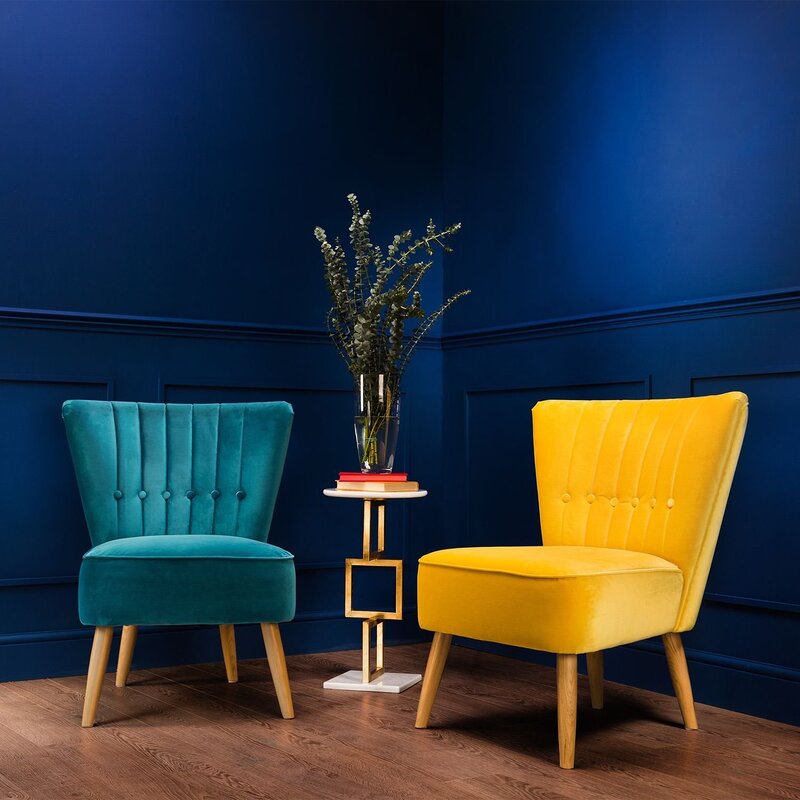 A blue armchair in the interior