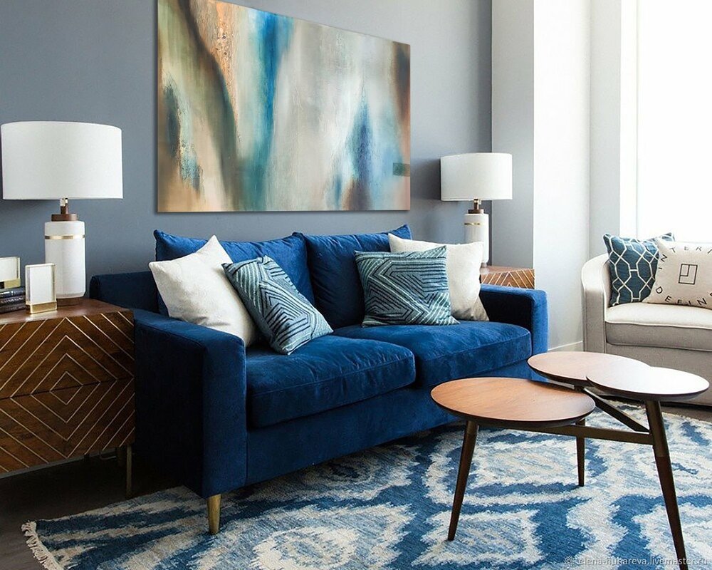 A blue sofa in the living room interior