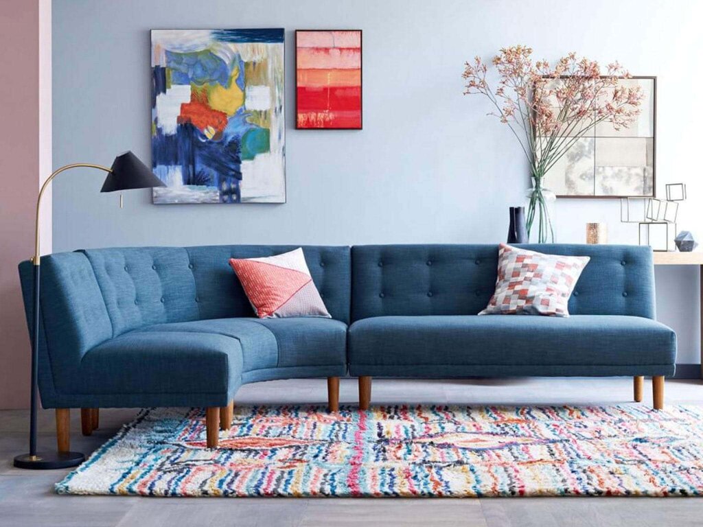 Blue sofa in a Scandinavian interior