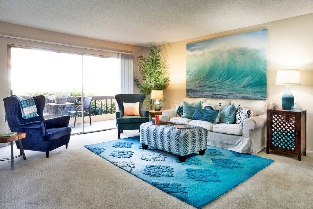 A blue carpet in the living room interior