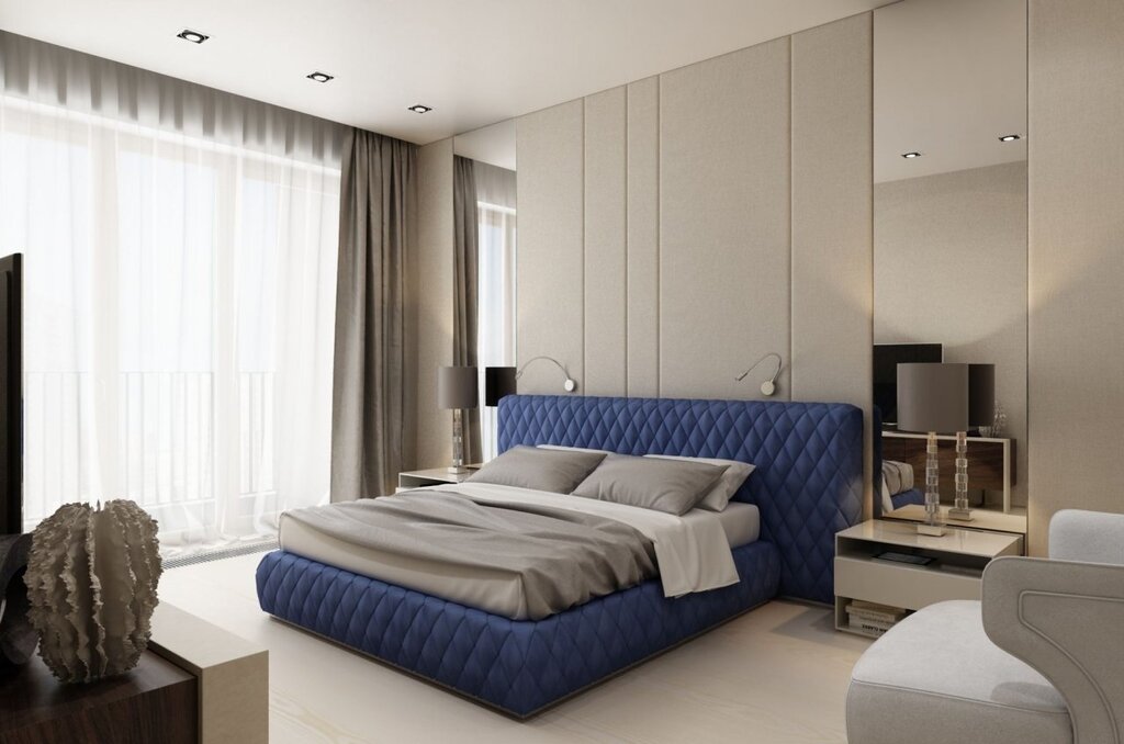 A blue bed in the bedroom interior