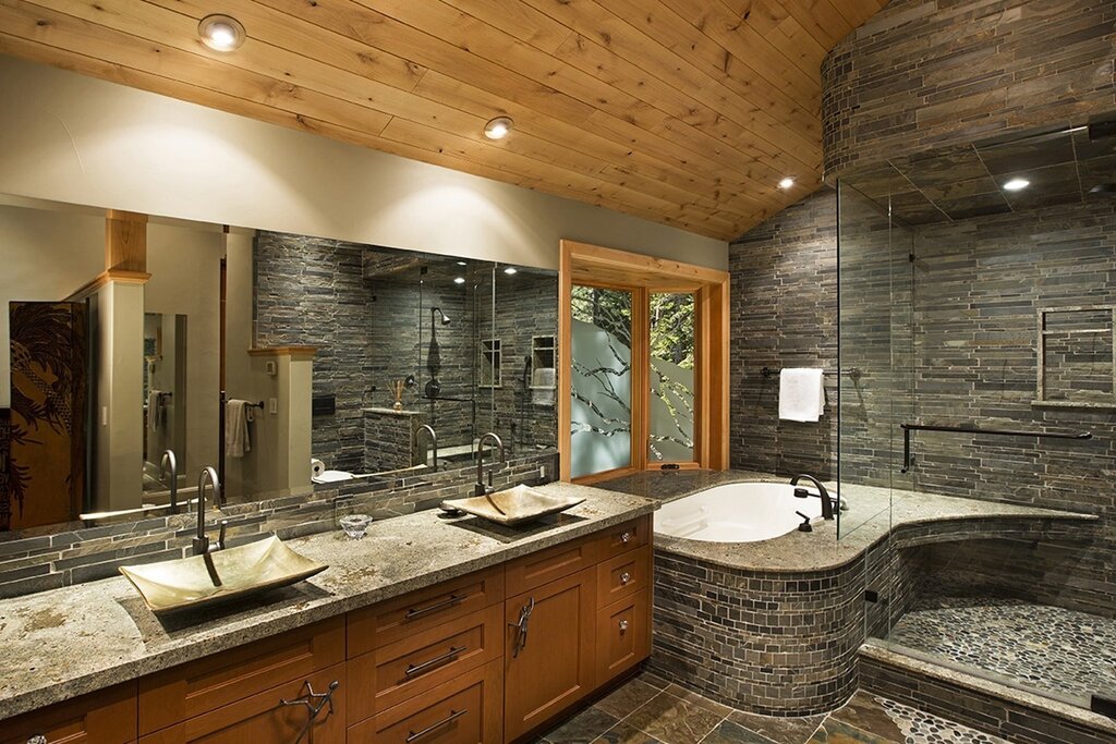 The combination of wood and stone in the bathroom