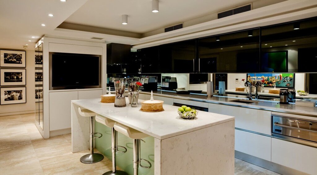 Modern kitchen with a TV