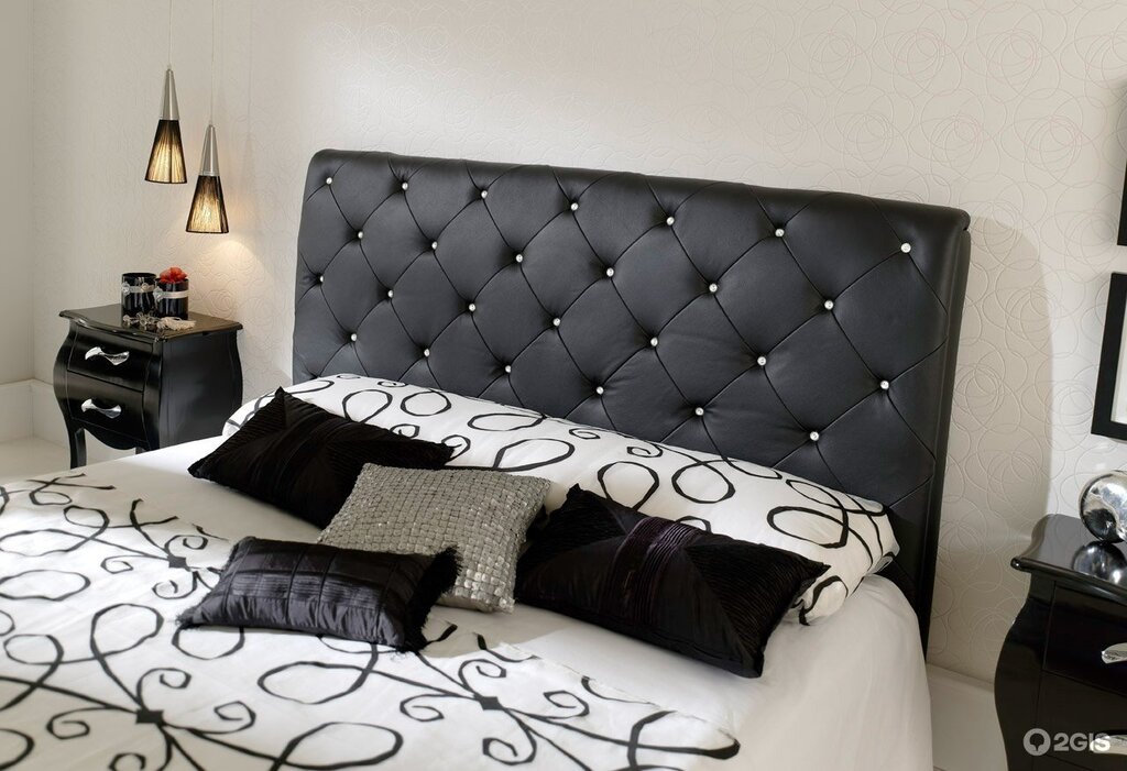 Bedroom with a black bed