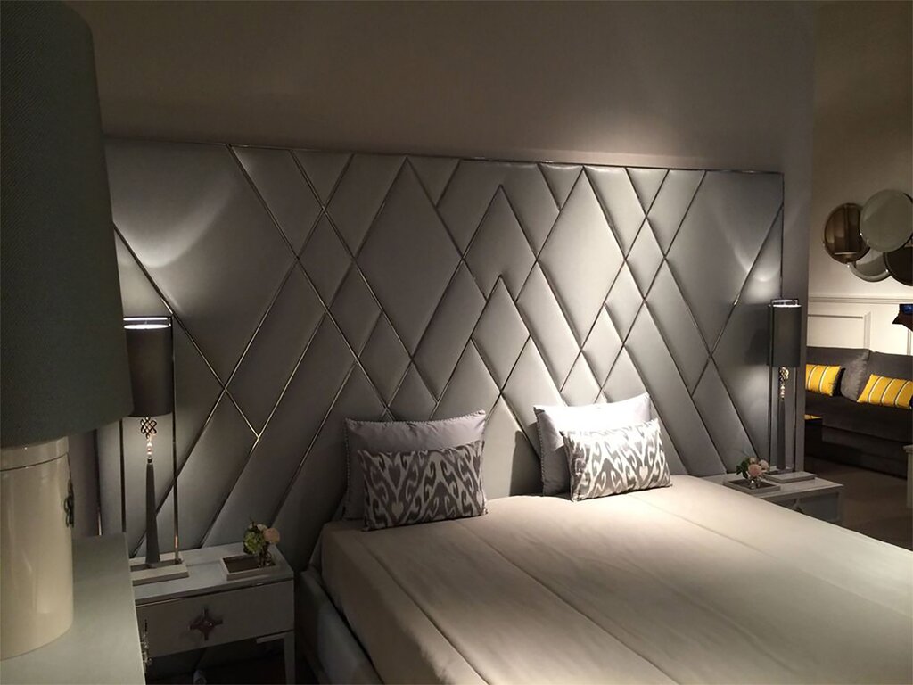 Bedroom with a soft headboard