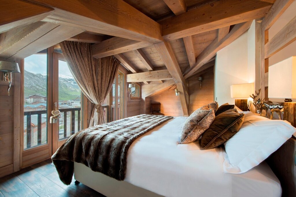 Bedroom in a wooden house