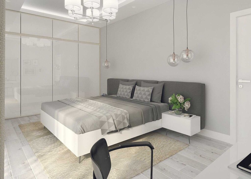 A bedroom in gray-beige tones