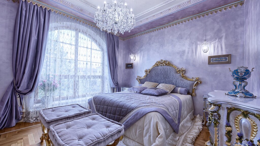 A bedroom in lilac color