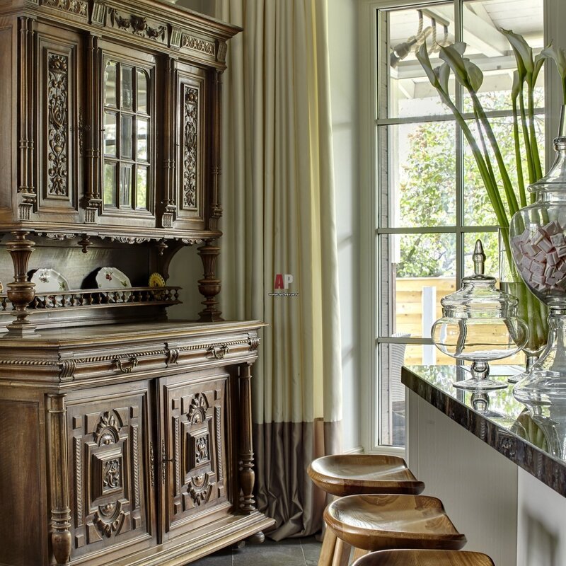 An antique sideboard in a modern interior