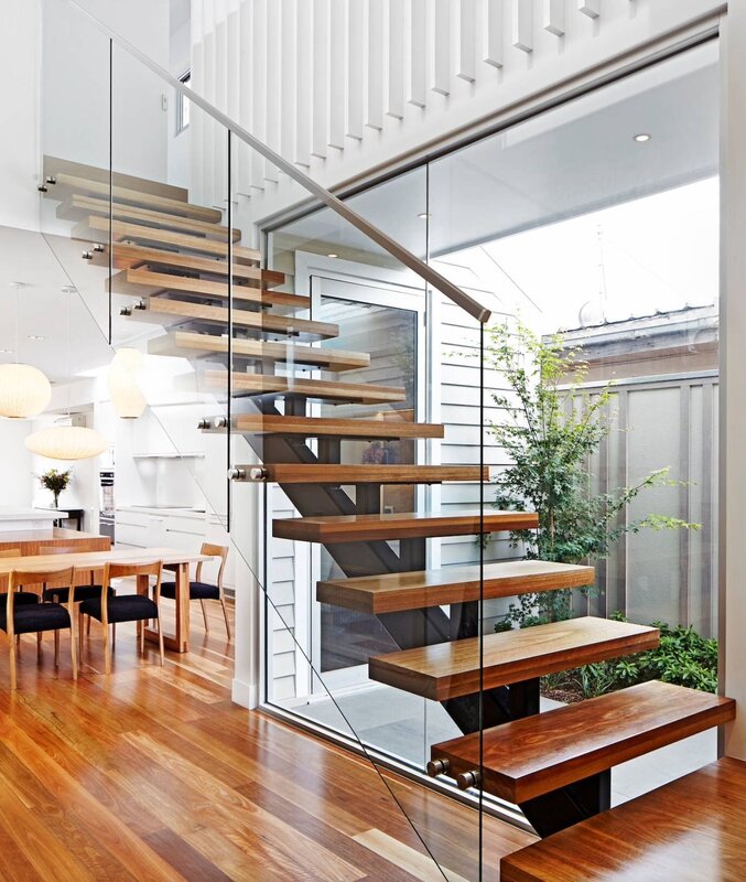 A glass staircase in the house