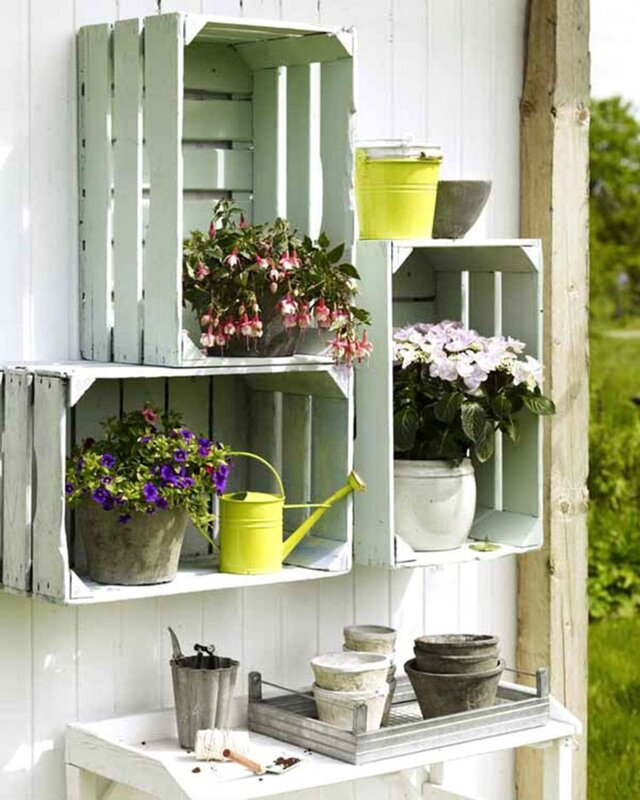 A shelving unit made of wooden crates