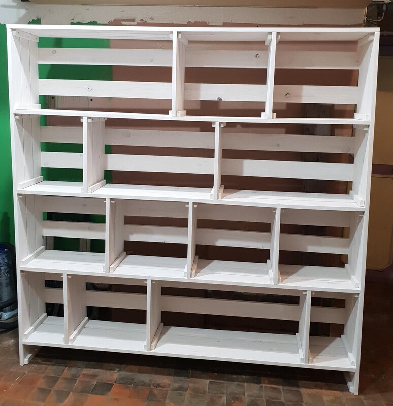 A shelving unit made of boxes