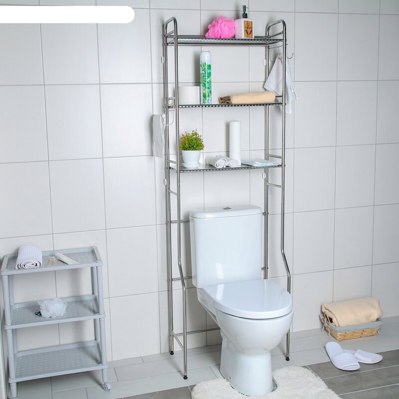 A narrow shelf for the toilet