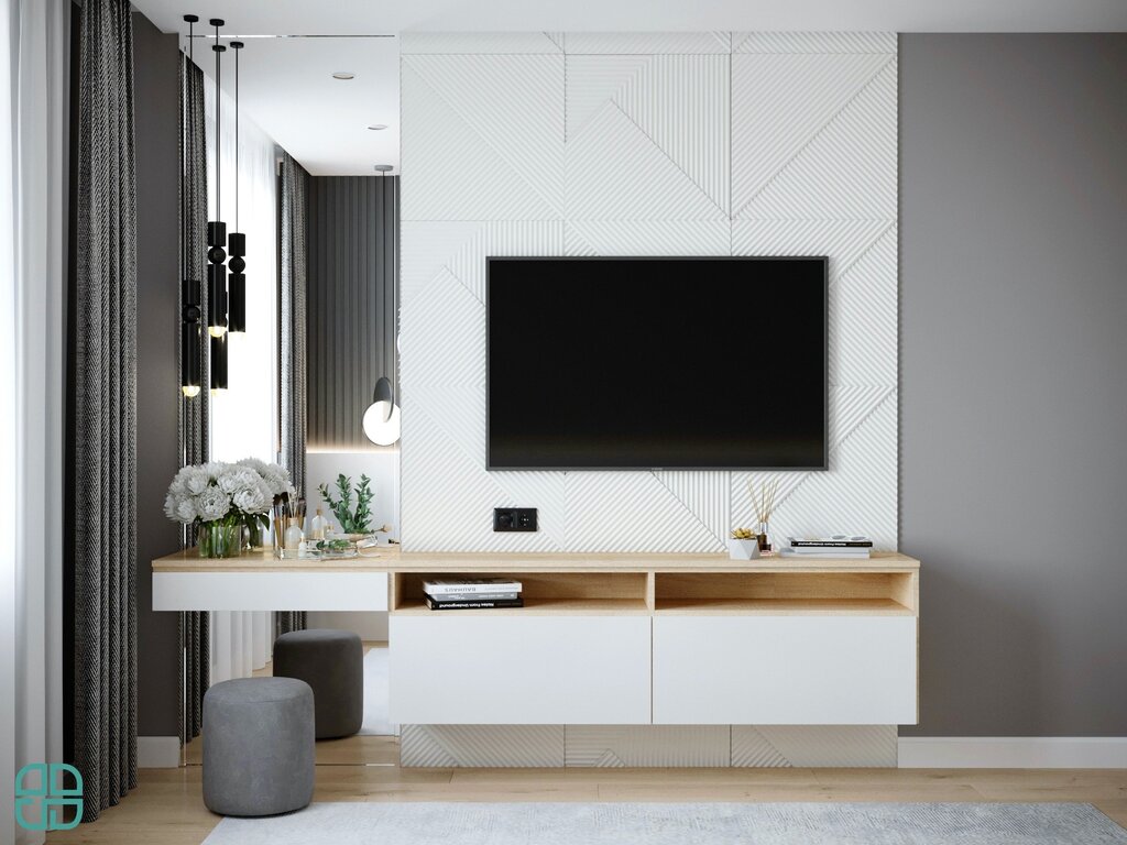 A wall unit in the bedroom with a vanity table