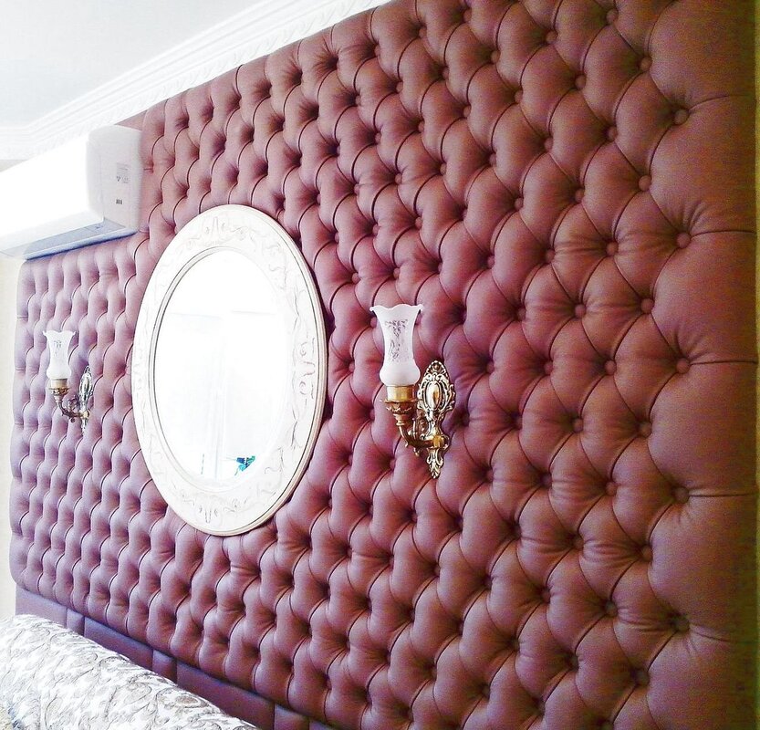 Wall panel tufted upholstery