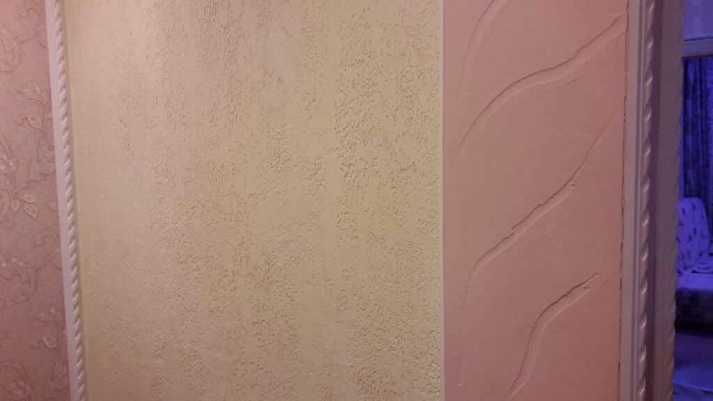 The joint of wallpaper and decorative plaster