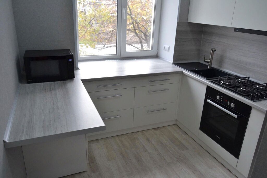 Countertop under the window in the kitchen