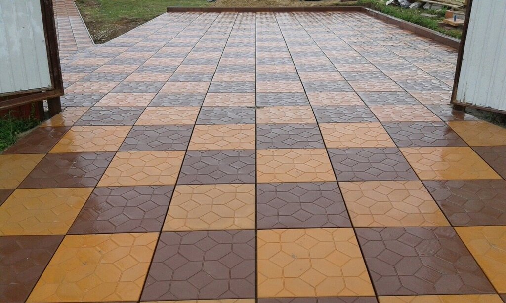 Dry-pressed paving tiles