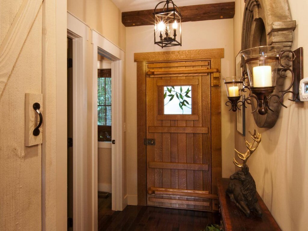 The light fixture above the door in the hallway