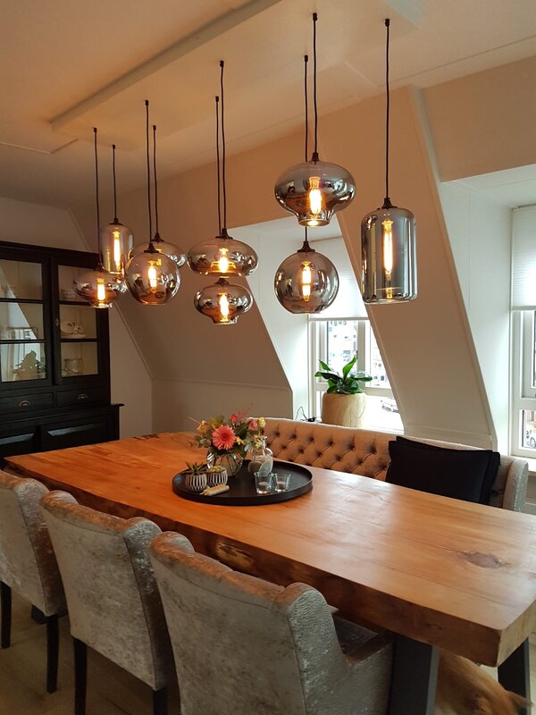 The lamp above the table in the kitchen