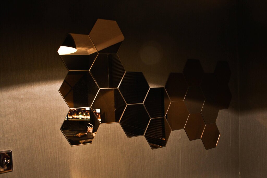 A honeycomb-shaped wall lamp