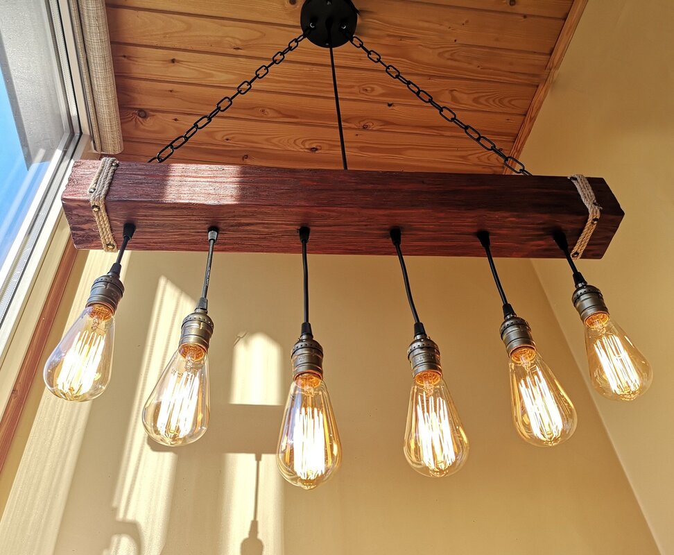 Lights on beams in a wooden house