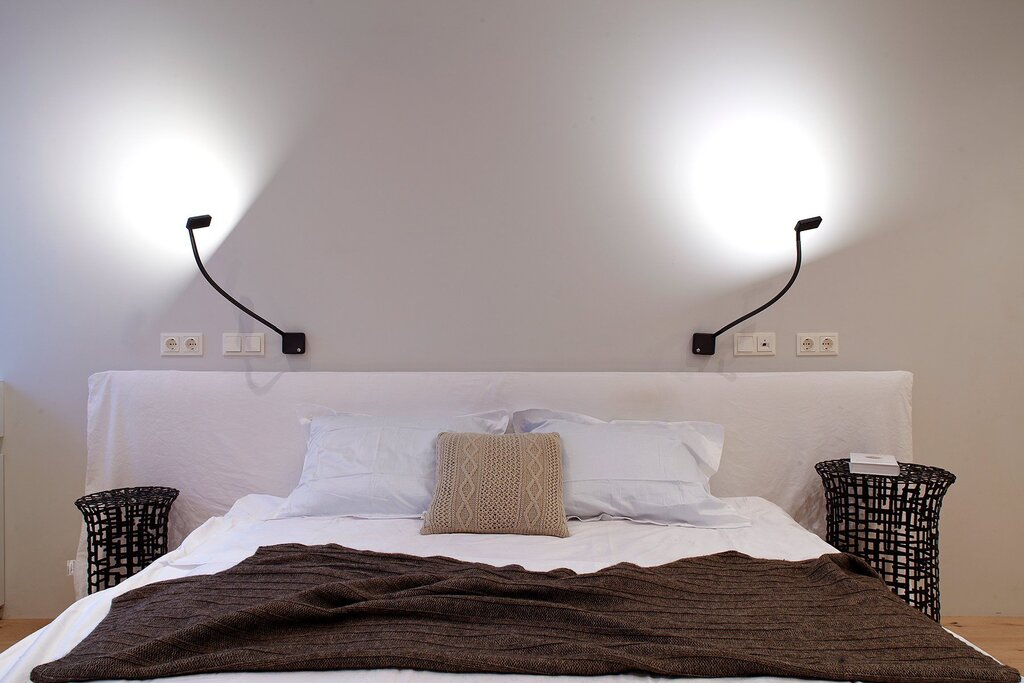 Lamps above the bed