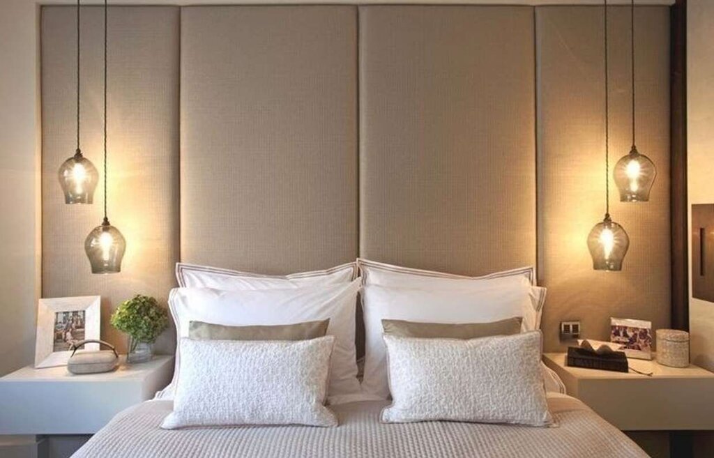 Lamps above the bedside tables in the bedroom