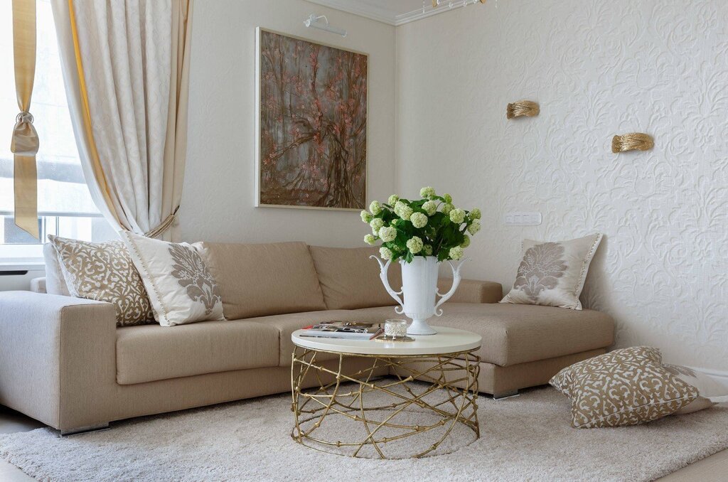 A light-colored sofa in the living room interior