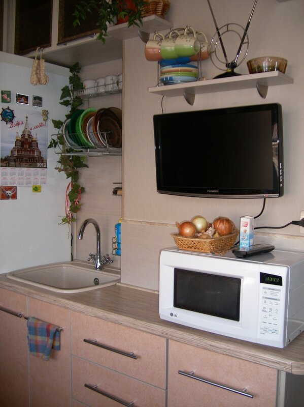 A TV in a small kitchen