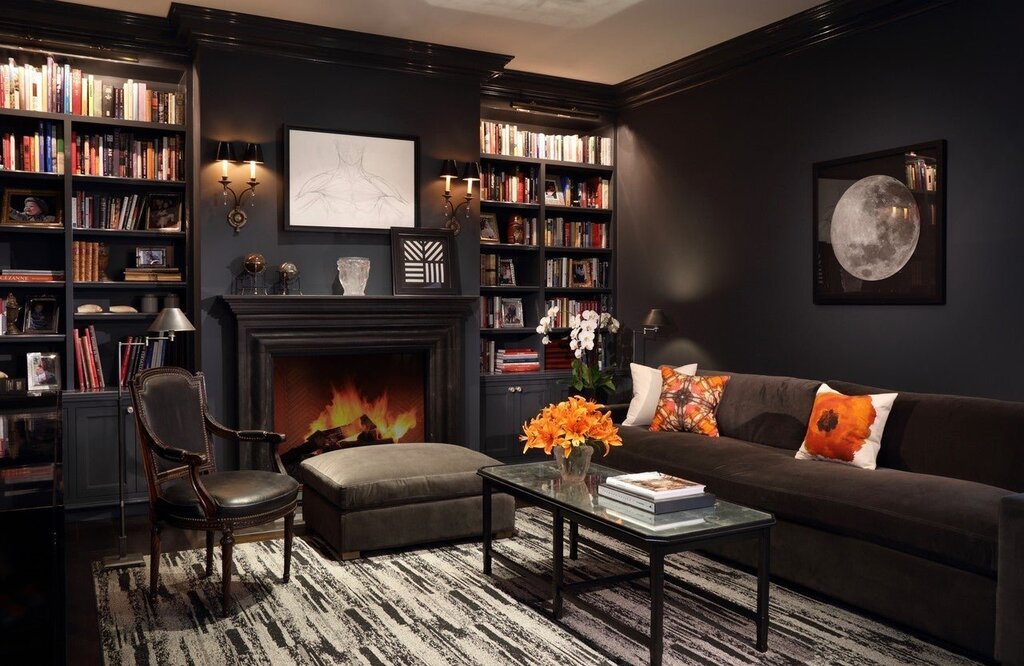 A dark room with a fireplace