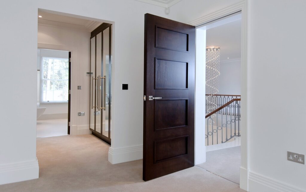 Dark doors in a light interior